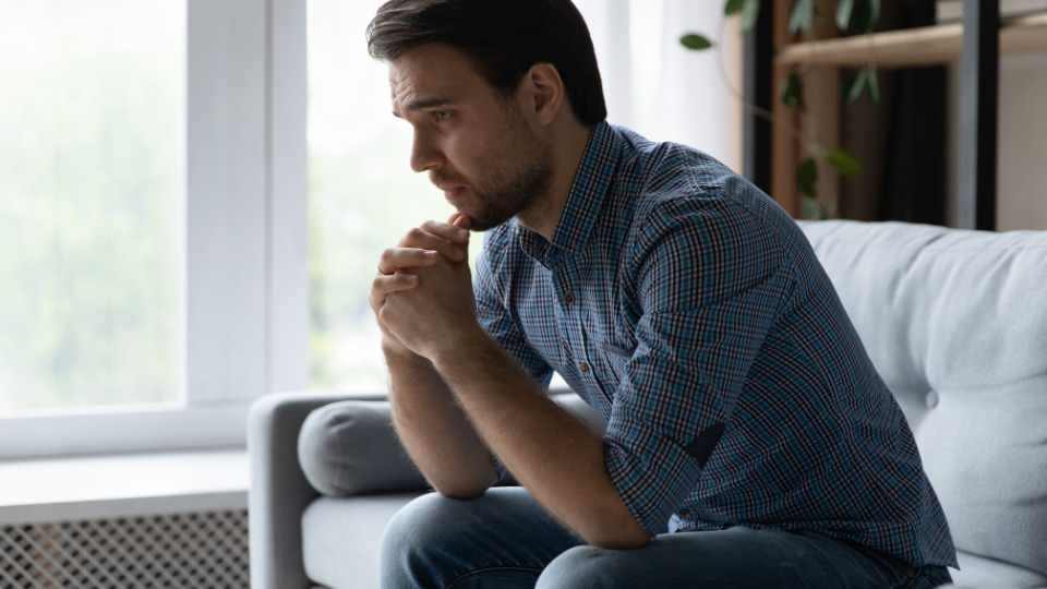 A dejected man, symbolizing grief. Image courtesy of tCaPc.